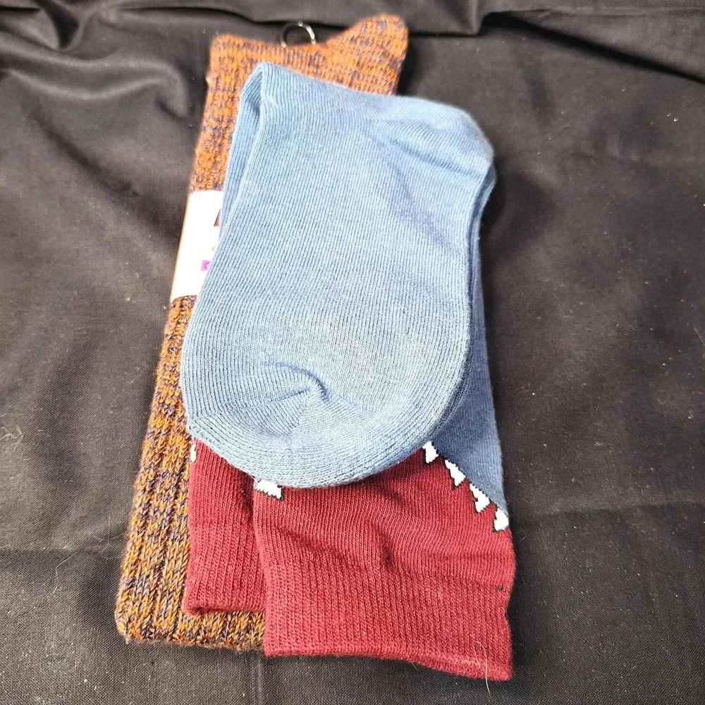 Women's one pair‎ of Mukluks Over the knee socks and on pair of Shark bite socks